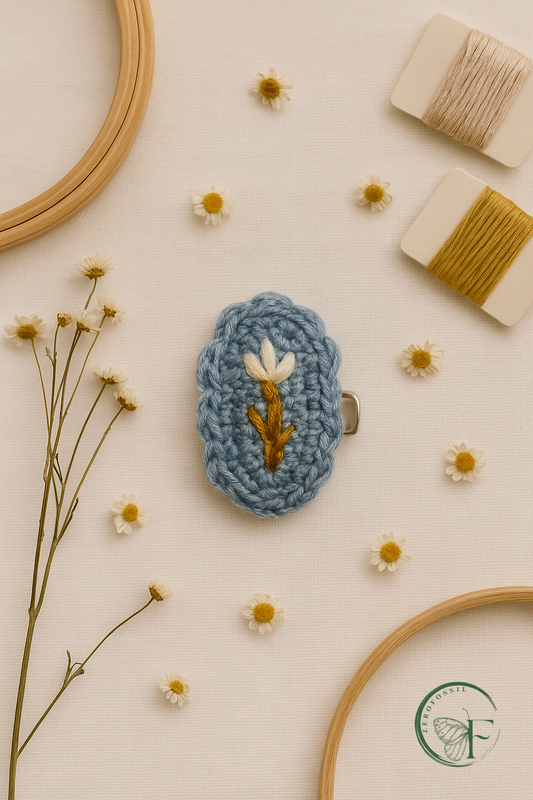 Blueberry Twig embroidered hair clip in soft blue crochet, perfect for spring baby outfits and slow fashion gifting