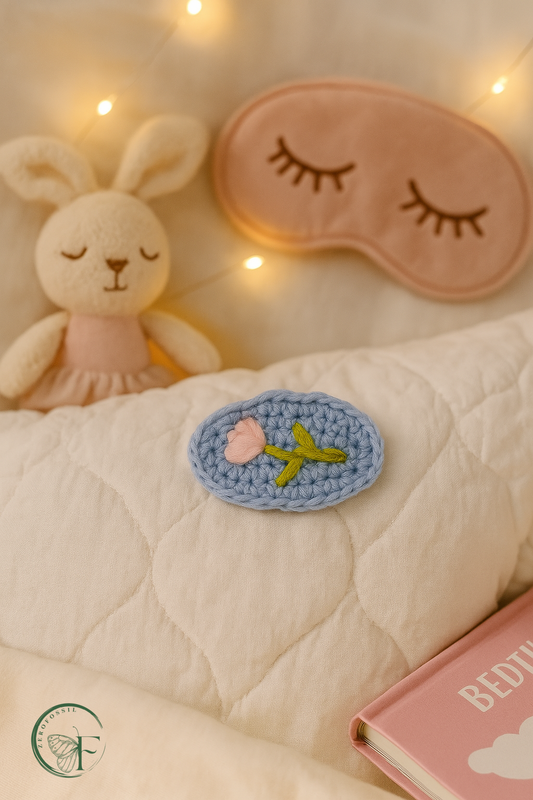 Pastel blue yarn hair clips with soft pink stitched flowers – eco-friendly crochet barrettes for baby girls