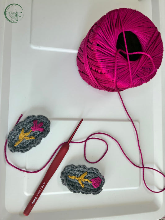 Crochet floral hair clips in moody grey with hot pink petals and mustard thread leaves – handmade toddler accessories