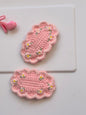 Handmade pink crochet hair clip with scalloped edges and embroidered white flowers – Cotton Candy baby girl accessory