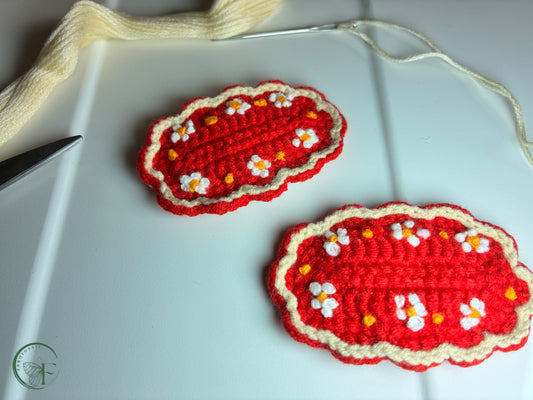 Vibrant red handmade hair clips with embroidered mini rosettes – crochet fashion accessory for girls and toddlers